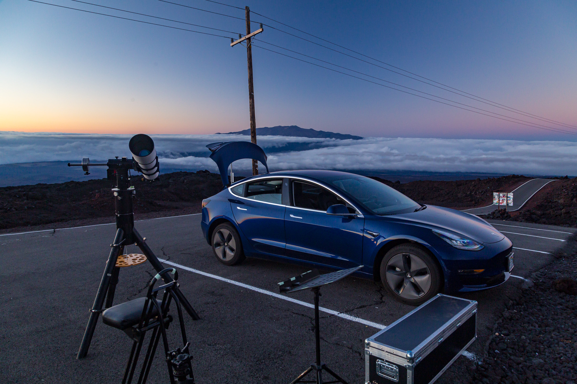 SVX152 set up at the end of the Mauna Loa Access Road with Maunakea in the background.